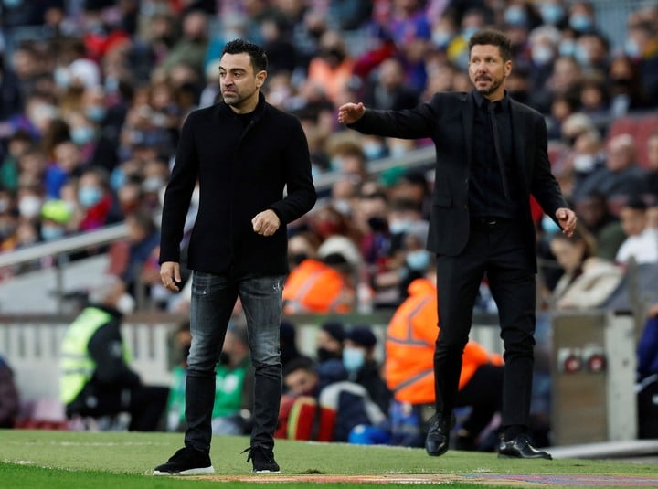 Buena onda entre Xavi y Simeone.