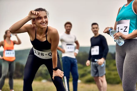 Happy Sportswoman Feeling Exhausted After Running Marathon Nature 1