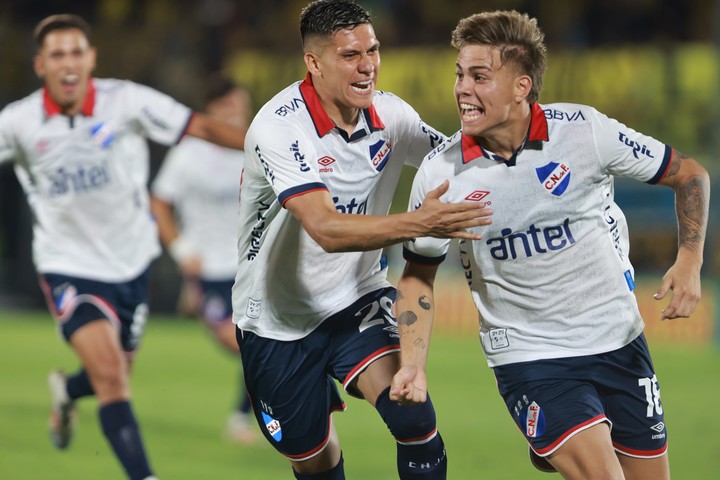 Julián Millán, a la izquierda de la foto, se destacó en Nacional (EFE). 